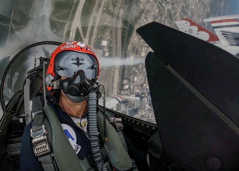 United States Air Force Maj. Michael "Thorny" Brewer, United States Air Force Air Demonstration Squadron "Thunderbird," slot pilot, F-16 passes the Cleveland Browns stadium during a show on September 6, 2021 in Cleveland, Ohio. This was a deployed show that involved the jets taking off from and landing at a different site from the air show.  (U.S. Air Force Photo by Tech. Sgt. Nicolas A. Myers)